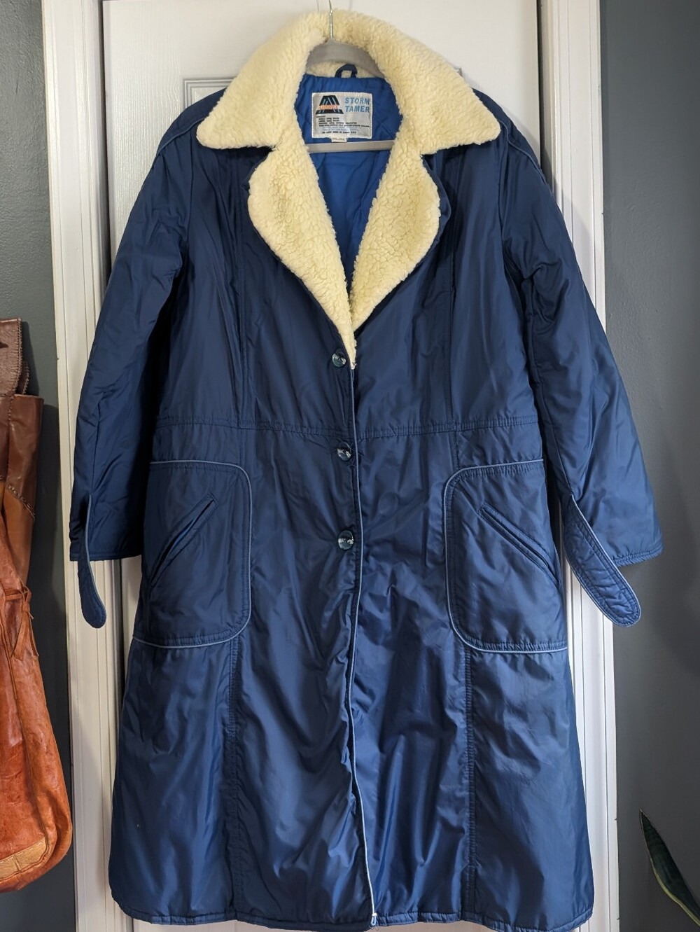 Vintage 70s or 80s blue Storm Tamer long puffer ski coat with faux fur lining